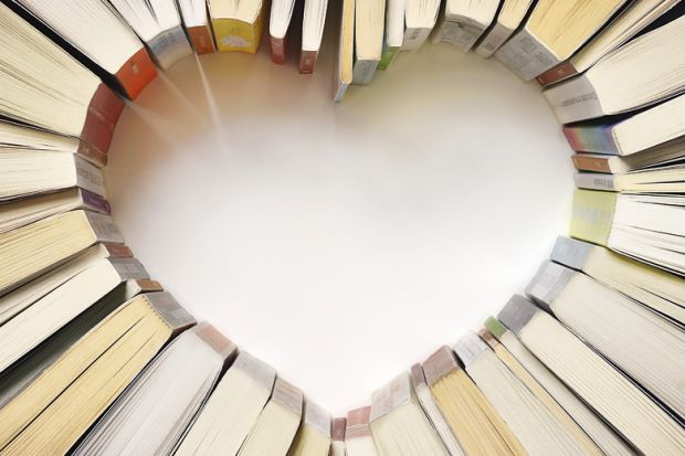 books-arranged-on-table-in-shape-of-heart.jpg